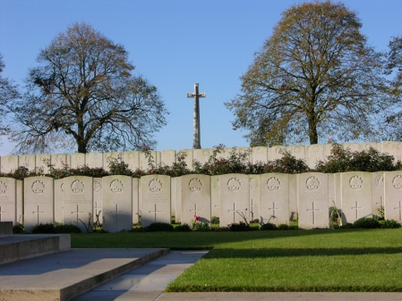 Gunner Brown lies in the graves to the left of the cross at Dernancourt Communal Cemetery Extension. (Image: CWGC website)